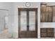 Walk-in pantry with double doors and glass inserts at 3749 E Juniper Cir, Mesa, AZ 85205