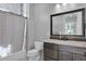 Bathroom with shower, vanity, and granite countertop at 3749 E Juniper Cir, Mesa, AZ 85205