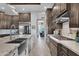 Open concept kitchen with stainless steel appliances and island at 3749 E Juniper Cir, Mesa, AZ 85205