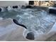 Clean and spacious hot tub with bubbling water at 3749 E Juniper Cir, Mesa, AZ 85205