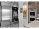 High-end stainless steel refrigerator and double ovens at 3749 E Juniper Cir, Mesa, AZ 85205