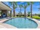 Relaxing kidney-shaped pool surrounded by lush landscaping at 3749 E Juniper Cir, Mesa, AZ 85205