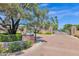Gated community entrance with a stone and brick design at 3749 E Juniper Cir, Mesa, AZ 85205