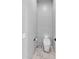 Modern bathroom with a toilet and marble flooring at 3749 E Juniper Cir, Mesa, AZ 85205