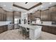 Spacious kitchen with stainless steel appliances and an island at 3749 E Juniper Cir, Mesa, AZ 85205