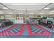 Large garage with epoxy flooring and storage solutions at 3749 E Juniper Cir, Mesa, AZ 85205