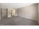 Spacious bedroom with carpet flooring and access to bathroom and hallway at 7920 E Camelback Rd # 206, Scottsdale, AZ 85251