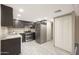 Modern kitchen with granite counters and stainless steel appliances at 7920 E Camelback Rd # 206, Scottsdale, AZ 85251