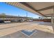 Covered parking garage with designated accessible parking spaces at 1130 N 2Nd St # 409, Phoenix, AZ 85004