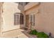 Exterior entryway with security door and small garden at 1301 W Coral Reef Dr, Gilbert, AZ 85233