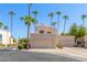 Two-story stucco home with attached garage and desert landscaping at 1301 W Coral Reef Dr, Gilbert, AZ 85233