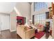 Open living area with hardwood floors and views into adjacent room at 1301 W Coral Reef Dr, Gilbert, AZ 85233
