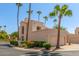 Two-story stucco home with attached garage and desert landscaping at 1301 W Coral Reef Dr, Gilbert, AZ 85233