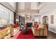 Spacious living room with high ceilings, fireplace, and hardwood floors at 1301 W Coral Reef Dr, Gilbert, AZ 85233