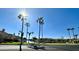 Beautiful view of a canal with palm trees and homes at 1301 W Coral Reef Dr, Gilbert, AZ 85233
