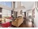 Bright living room featuring hardwood floors and a fireplace at 1301 W Coral Reef Dr, Gilbert, AZ 85233