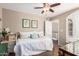 Bedroom with a daybed, ceiling fan and window at 1301 W Coral Reef Dr, Gilbert, AZ 85233