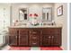 Double vanity bathroom with granite countertops at 1301 W Coral Reef Dr, Gilbert, AZ 85233