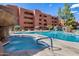Relaxing pool and spa area with comfortable seating at 4303 E Cactus Rd # 441, Phoenix, AZ 85032