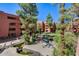 Peaceful courtyard with seating area and water feature at 4303 E Cactus Rd # 441, Phoenix, AZ 85032