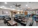 Community room with comfortable seating, kitchenette and tables at 4303 E Cactus Rd # 441, Phoenix, AZ 85032