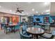 Community clubhouse with seating area and a large screen TV at 4303 E Cactus Rd # 441, Phoenix, AZ 85032