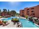 Community pool with waterfall feature at 4303 E Cactus Rd # 441, Phoenix, AZ 85032