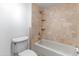 Bathroom with beige tile and shower/tub combo at 4303 E Cactus Rd # 441, Phoenix, AZ 85032
