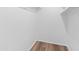 Spacious closet with wood laminate flooring and white walls at 4303 E Cactus Rd # 441, Phoenix, AZ 85032