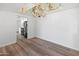 Elegant dining room with hardwood floors and chandelier at 4303 E Cactus Rd # 441, Phoenix, AZ 85032