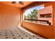 Private balcony with tiled floor and view of surrounding buildings at 4303 E Cactus Rd # 441, Phoenix, AZ 85032