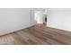 Bedroom with laminate flooring and view of another room at 4303 E Cactus Rd # 441, Phoenix, AZ 85032