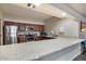 Well-equipped community kitchen with granite countertops at 4303 E Cactus Rd # 441, Phoenix, AZ 85032