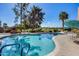 Inviting community pool with surrounding patio furniture at 4303 E Cactus Rd # 441, Phoenix, AZ 85032
