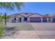 Single-story home with two-car garage and desert landscaping at 35925 N 30Th Dr, Phoenix, AZ 85086