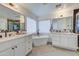 Spa-like main bathroom with soaking tub and double vanity at 35925 N 30Th Dr, Phoenix, AZ 85086
