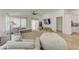 Bright and airy living room featuring a comfortable sectional sofa and large TV at 35925 N 30Th Dr, Phoenix, AZ 85086