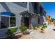 Modern two-story home with stone accents and well-manicured landscaping at 2150 W Alameda Rd # 1273, Phoenix, AZ 85085