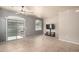 Living room with tile floors, ceiling fan, and patio access at 2150 W Alameda Rd # 1273, Phoenix, AZ 85085