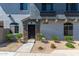 Modern two-story home with stone accents and well-manicured landscaping at 2150 W Alameda Rd # 1273, Phoenix, AZ 85085