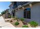 Modern two-story home with stone accents and well-manicured landscaping at 2150 W Alameda Rd # 1273, Phoenix, AZ 85085