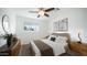 Well-lit bedroom featuring a queen-size bed and stylish nightstands at 1642 W Capri Ave, Mesa, AZ 85202
