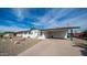 Charming single story home with carport and landscaped front yard at 1642 W Capri Ave, Mesa, AZ 85202