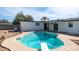 Inviting backyard pool with diving board at 1642 W Capri Ave, Mesa, AZ 85202