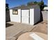 Backyard with storage shed and patio area at 1642 W Capri Ave, Mesa, AZ 85202