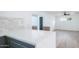 Modern kitchen features white quartz countertops and gray cabinetry at 1642 W Capri Ave, Mesa, AZ 85202