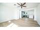 Bright living room with wood-look floors and an open concept layout at 1642 W Capri Ave, Mesa, AZ 85202