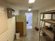 Unfinished basement with shelving and extra storage at 1642 W Capri Ave, Mesa, AZ 85202