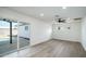 Spacious bedroom with sliding glass doors leading to the pool at 1642 W Capri Ave, Mesa, AZ 85202