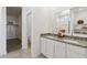 Double vanity bathroom with granite countertops and walk-in shower at 1563 E Lardner Dr, Casa Grande, AZ 85122